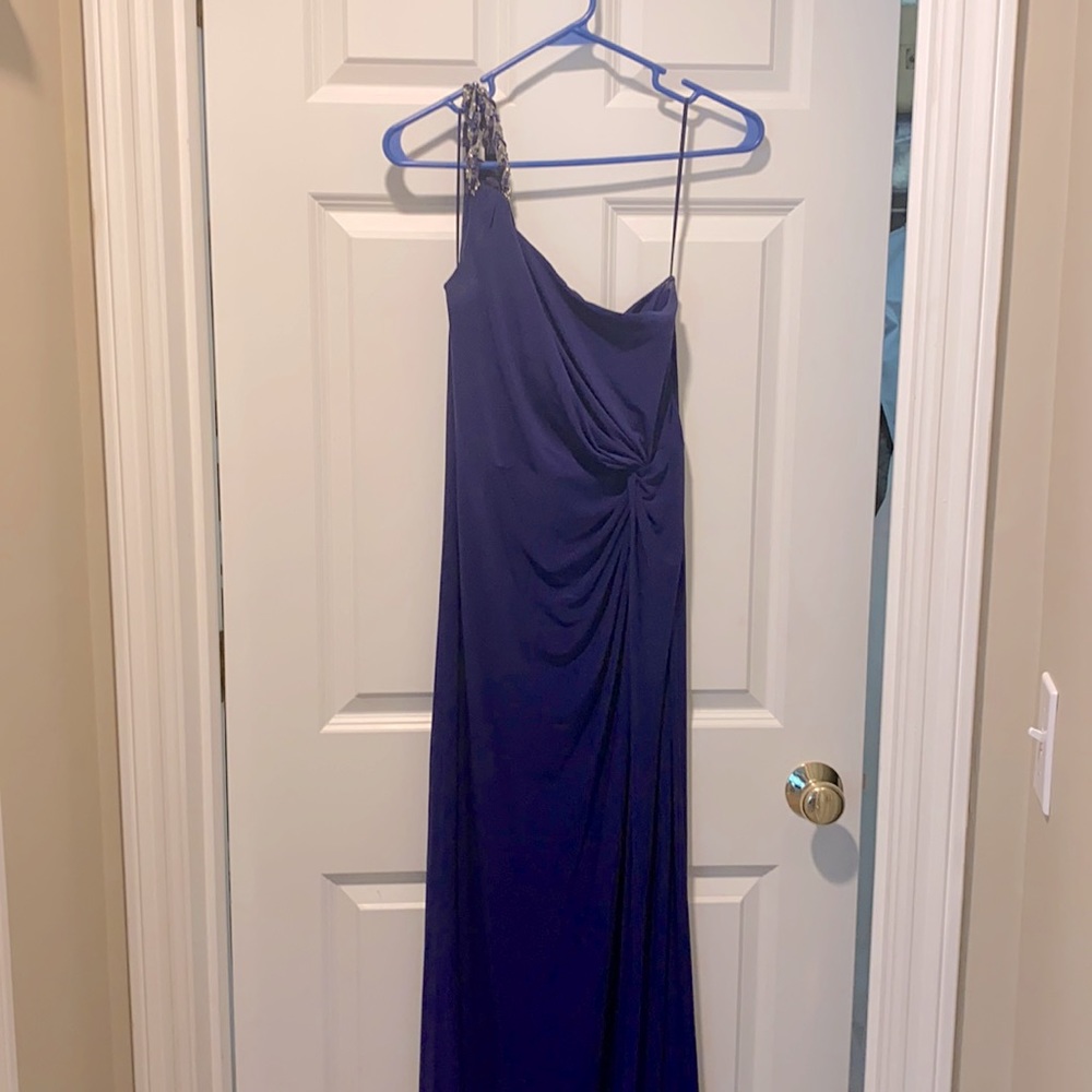 Purple one shoulder evening gown